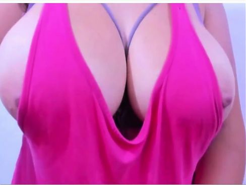 latina in pink seduces me with her big tits