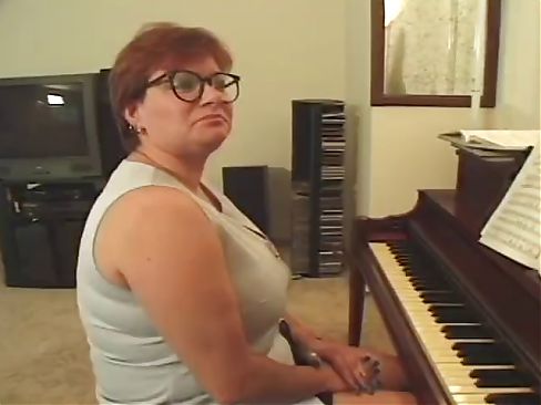 Plump piano teacher busted getting skewered with two cocks